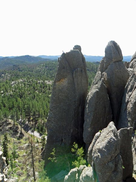 Climber nearing the top of "Tee the Ball" on 3 Sept 2011 -- photo taken from the Tricouni Nail