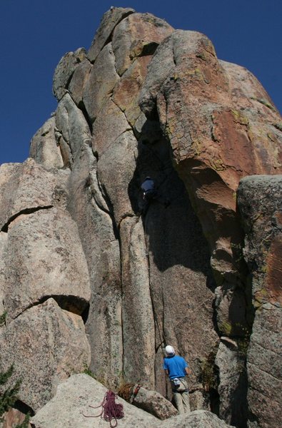 Matt Coffman on the second ascent milking one of the few rest stances before the second crux.