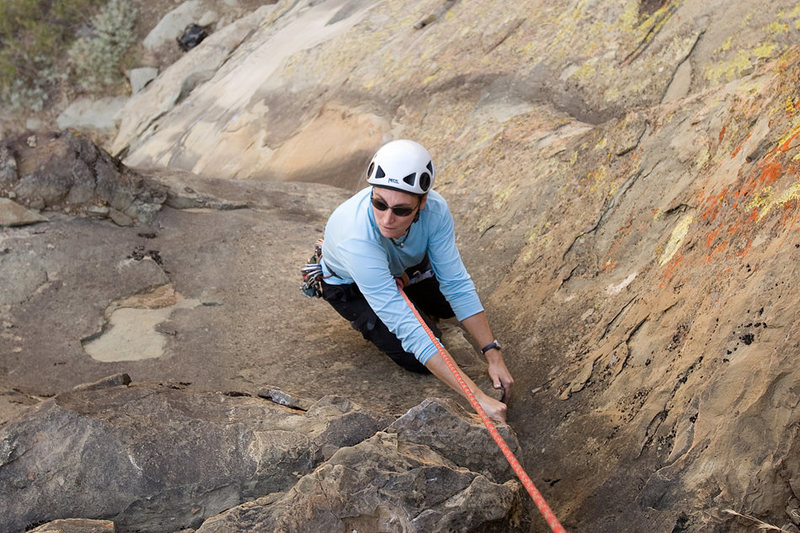 Marisa Fienup nears the top of the dihedral. Exilis Dihedral, Derrydale Cliff.