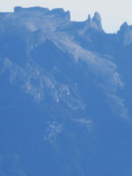 Mount Kinabalu summit plateau. Numerous climbing lines on granite spires. Noone ever climbs them.