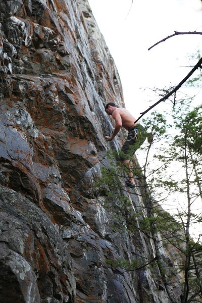Climber midway up the first half of Going Home, 5.10a