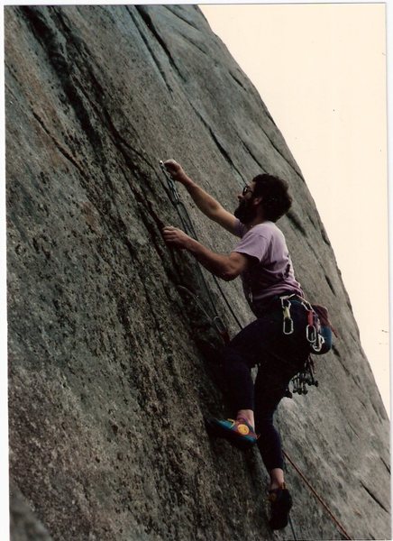 Eddie Begoon tightens the first bolt on Direct start to Hyperbola,Sea of Brows by The Waste Side & The 1988.