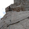 Me heading up a route in Akyalar; beach cliff climbing