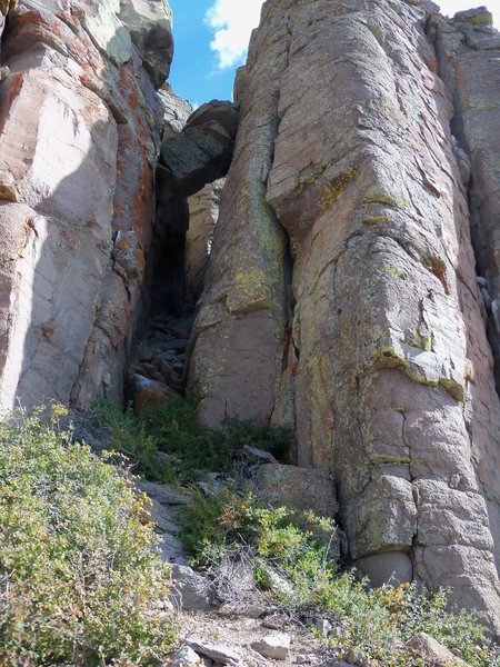 Up the talus shoot - you'll see the bolts on the right