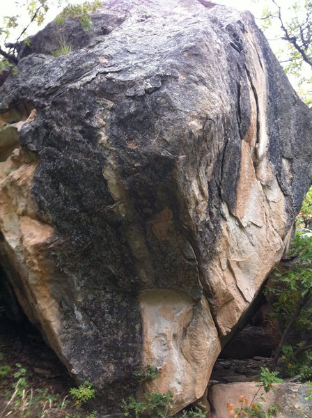 Arete is on the right of the boulder.