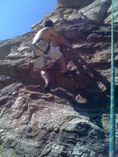 Me climbing the lower section of "Parole" on TR.