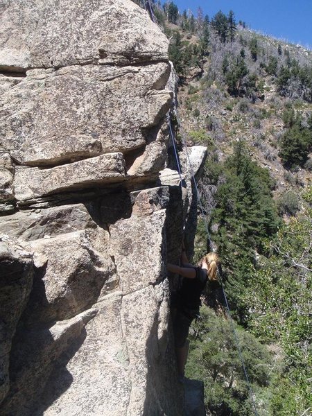 Amanda C climbing Ace Dick