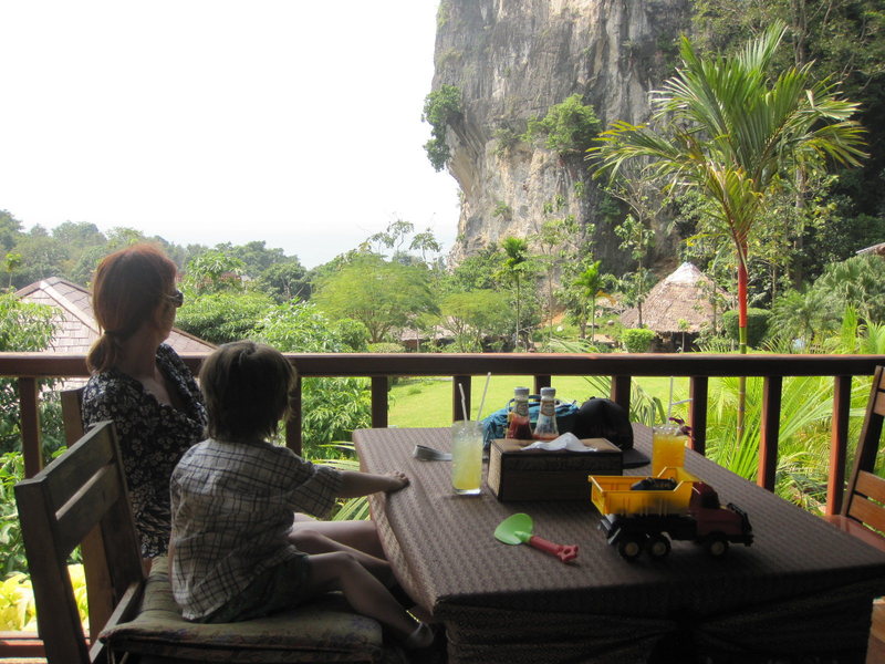 Watching climbers at Diamond Cave while eating breakfast from the best view in Rai Lay.