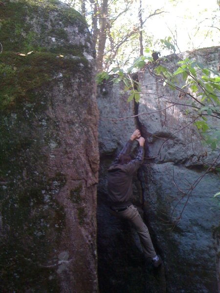 John climbing Pit Crack in his tennis shoes.