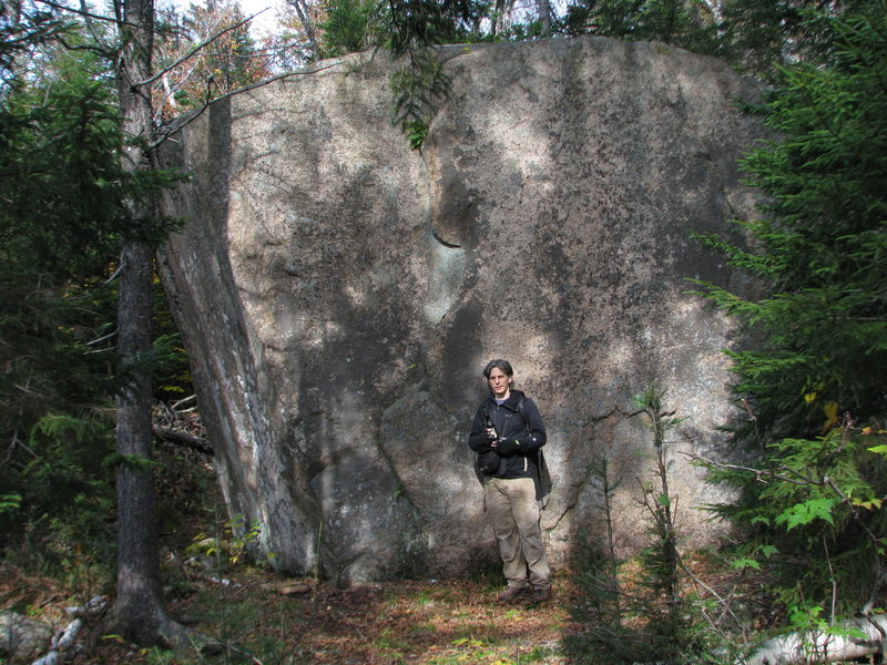 One of the nice boulders out at Owl's Cliff. This one is found by taking a spur off to the left a few hundred feet, a few hundred yards before you get to the Oracle boulders. It has good climbing almost all the way around it, and a nice flat landing. Dave Quinn developed most of the routes here. I'm not sure if he ever gave it a name.