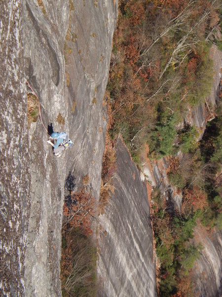 Mary finishing up the crux pitch and starting to link into the 9+ pitch of Traditions.