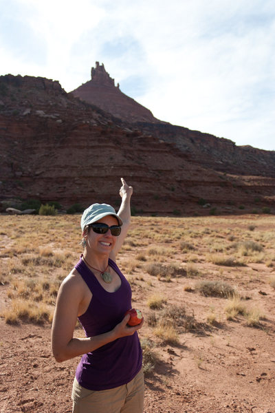 Polly pointing at the South Six Shooter tower (climbed day 6 in the Creek)