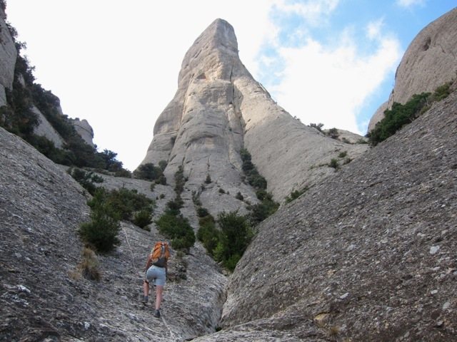 Climber's trail with fixed ropes below the east side of Cavall Bernat
