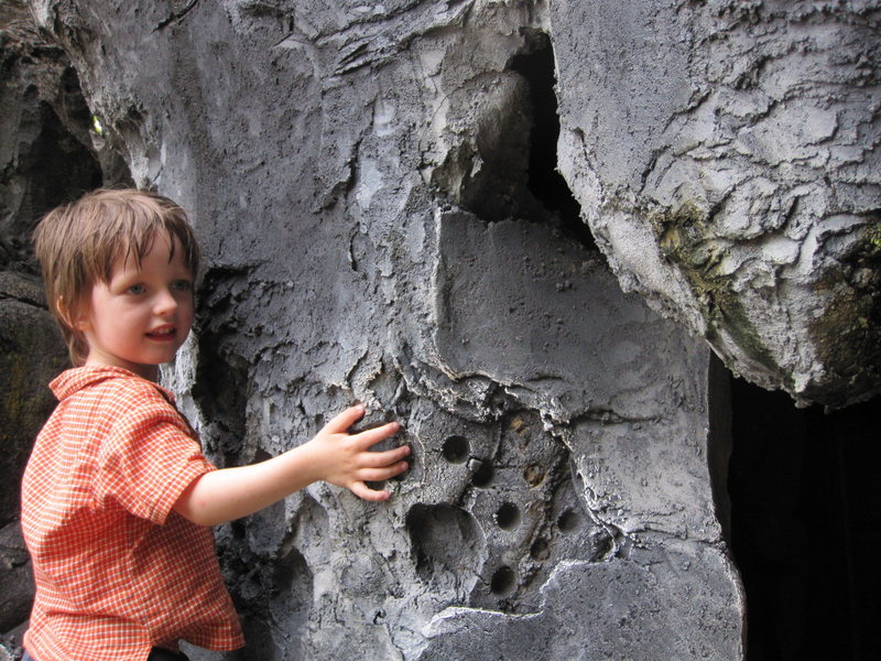 Artificial wall designed to blend in with the natural surroundings at the entrance to The Zoo. Sharp warm-up. Kiran still enjoyed it.