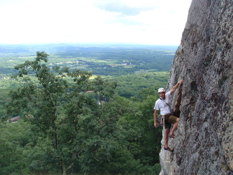 Unknown climber at the crux bulge on p. 2 of Grand Central.