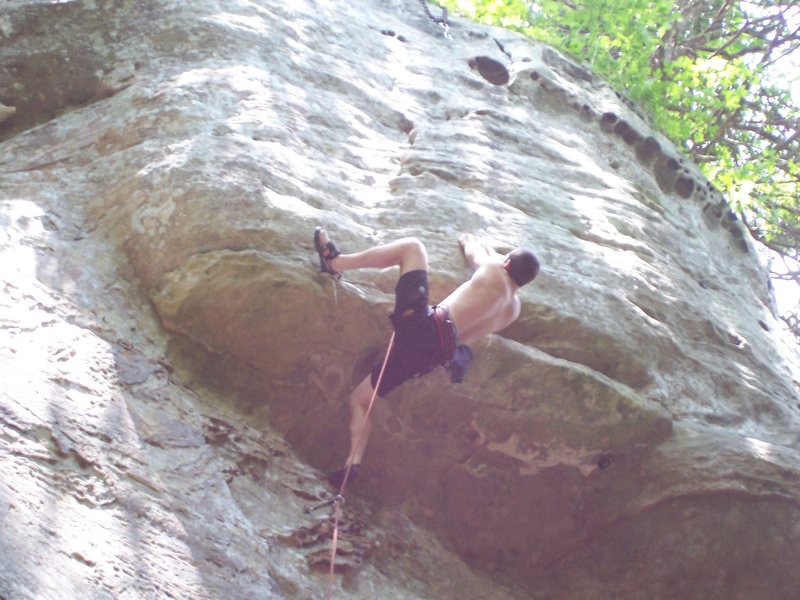 Redpoint crux, one last move to the good layback.