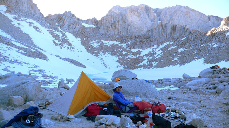 Whitney's East Face done. Clean clothes, dinner, a cold one. Russell going down the next day. Photo. Logan