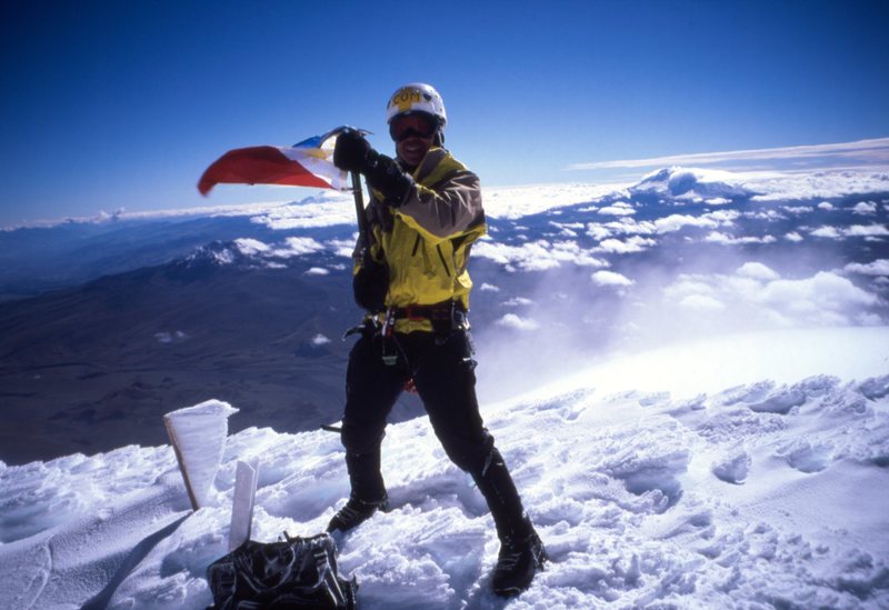 waving my flag, Cotopaxi summit. summer 2002. Photo hans or jon