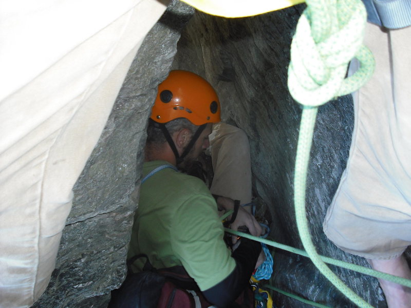Climbing under the stone below the last pitch of the daddy. Good place to relax and take shelter from the wind.