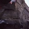 greg epperson on the big overhang, back when there was bouldering at La Jolla Cove (the cliffs are now under tons of sand)