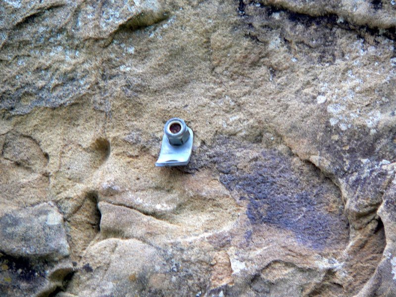 Sketchy, sketchy sport bolts. There's a variety of types on the rock and I wouldn't trust any of them. (Check out the rusted bolt in there!)