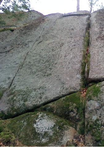 Straight up left of the wide crack.