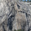 From the East Butt of El Cap on the left to The Big Juan (left of black streaks). Slab Happy Pinnacle is the gold finger in the center, about 350' tall.  Golden Years is off this photo, to the right.