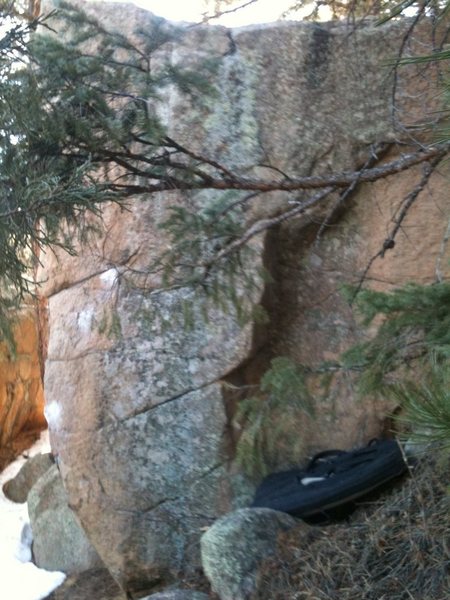 Terrible picture, but you get the idea. Start between the two slashes with one hand on the left of the dihedral on a crimp and one hand in the dihedral on an undercling.
