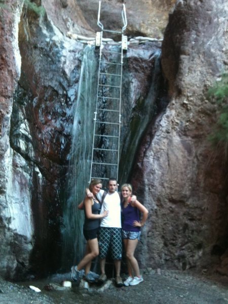 Hot Springs Arizona Side. That ladder gets a little shaky climbing, plus is soaked and slippery from the water! Theres a big man made pool at the top.