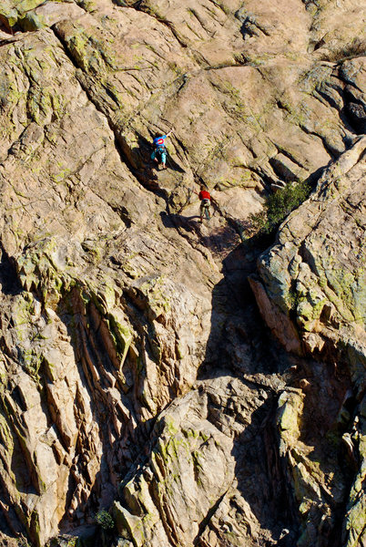 I will go out on the limb and call this the FDA (First Dreadlocked Ascent) by Jamie Tinnin and Ella Bump. December 2011.