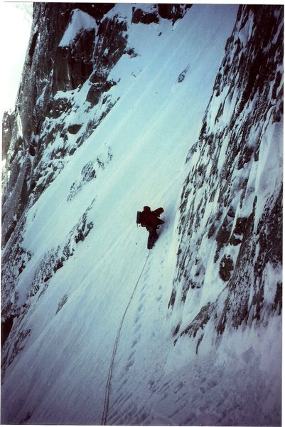 Jeff Burton on upper part of snowfield leading into base of the N.Q. Couloir, April 1992.