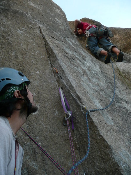 5.10b move below and left of the leader's feet, on the slab