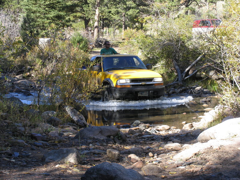 Zach crosses La Bonte Creek just downstream of the Curtis Gulch FS Campground