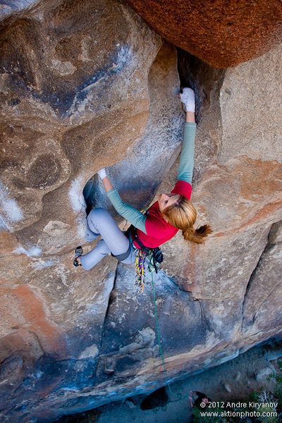 Leah Sandvoss sending "Leave it to Beaver", 5.12a, Joshua Tree National Park, CA. Photo by Andre Kiryanov