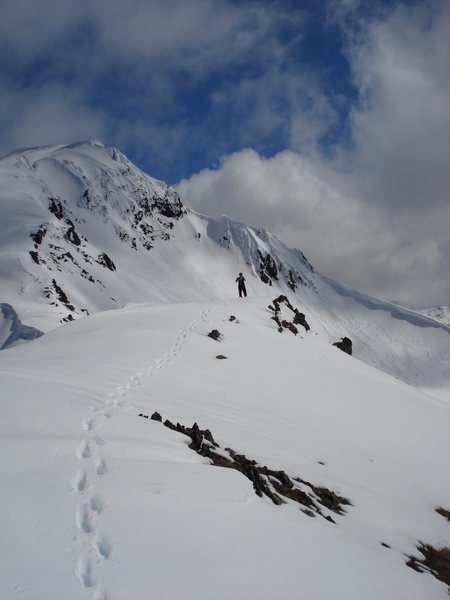 Tiffany at the top of the diamond w/ the summit ridge in the background