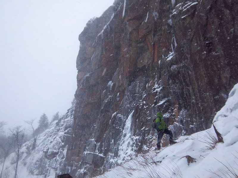 Scott Arno below the main face of Azure Mountain
