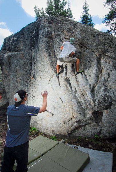 The Bolt Boulder is really close to the parking lot and worth checking out even if you are just passing by. <br>
<br>
Here Andrew is trying to figure out the crux top-out. <br>
<br>
7/31/10