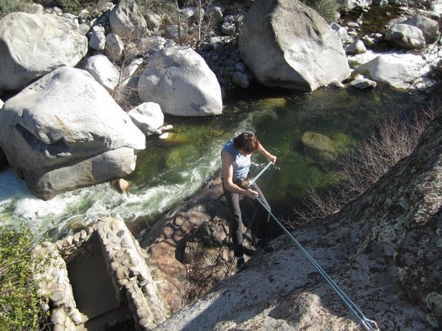 Short and simple line, but with a spectacular view of the river. <br>
<br>
Lazy rappel to the base for some laps on the south face of the cave boulder -Late 2010