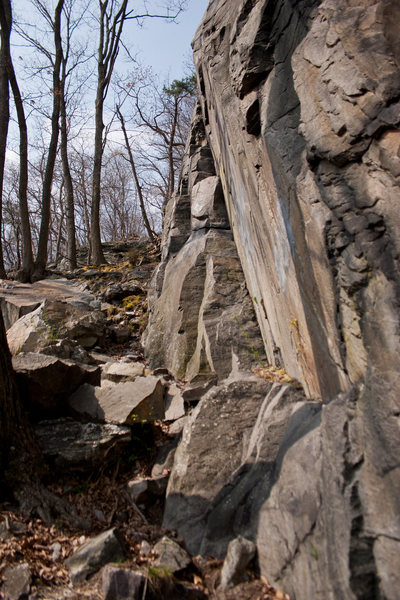 About the center of the main wall looking left (west). Follow this trail up to top of route to place gear TR anchor.