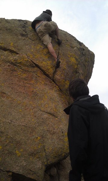 Matt doing Y crack on the Y boulder.