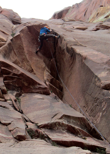 Ryan Strong in the crux of the first pitch of Challenger. 