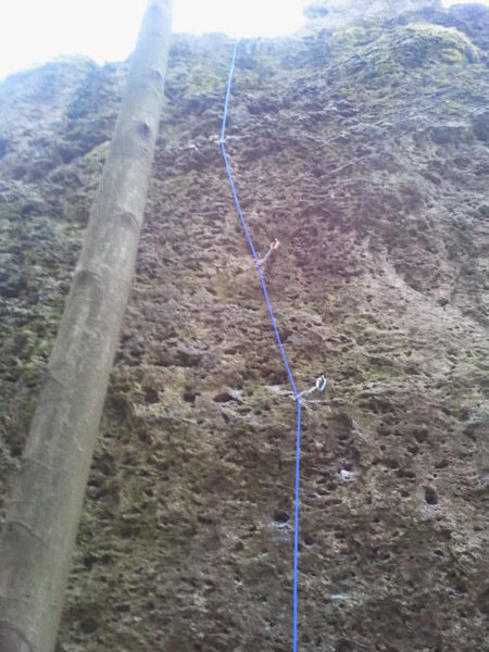 In this picture you can only see the first three clips. The easier ground is above to a fourth clip (use a runner) and up the left side.