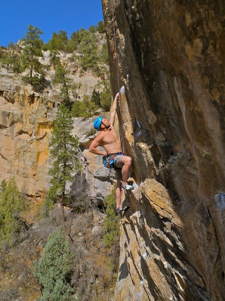 Unidentified Durango rope-soloist gets his Ape on. Follow the "Simians" crack about 20 feet, cut left to a ledge over some easy runout face climbing, begin "Apes" here (bolt line immediately left of the Watch Crystal Crack).