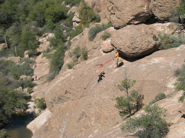 Aaron watches from the top as Jonathan makes his way up