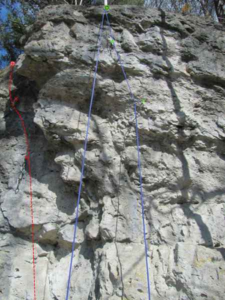 The red route on the left is Das erste Mal, and the route with the green Xs and rope hanging from it is Lampenfuzzi.