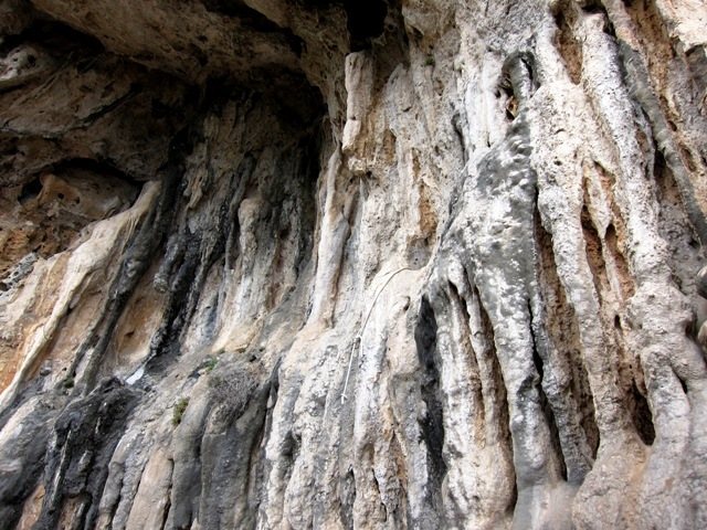 Crazy rock at the base of the short, shallow overhang at Cimitero
