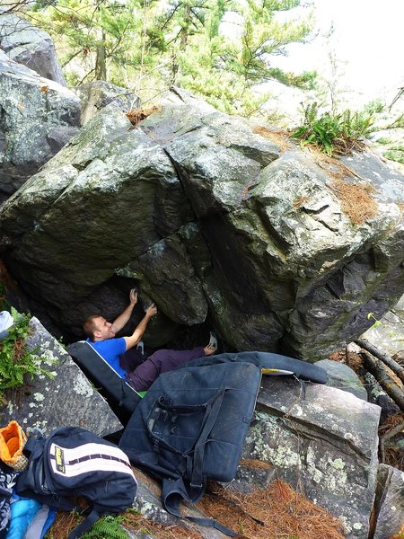 Start. We assumed the detached block on the right under the boulder was off. Steve climbing.