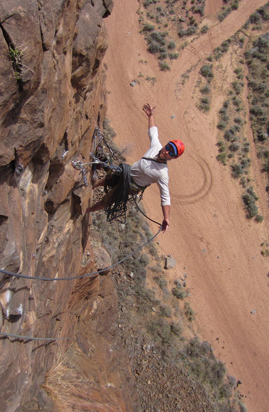 Mike Phalan enjoys the Final Belay during the FA<br>
Heat Seeker (5.11-)