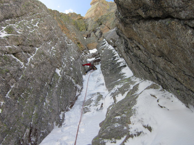 Chris on the 2nd pitch, just below start of the crux chimney. We took the left-most right-facing dihedral system above for our 4th pitch to Broadway.