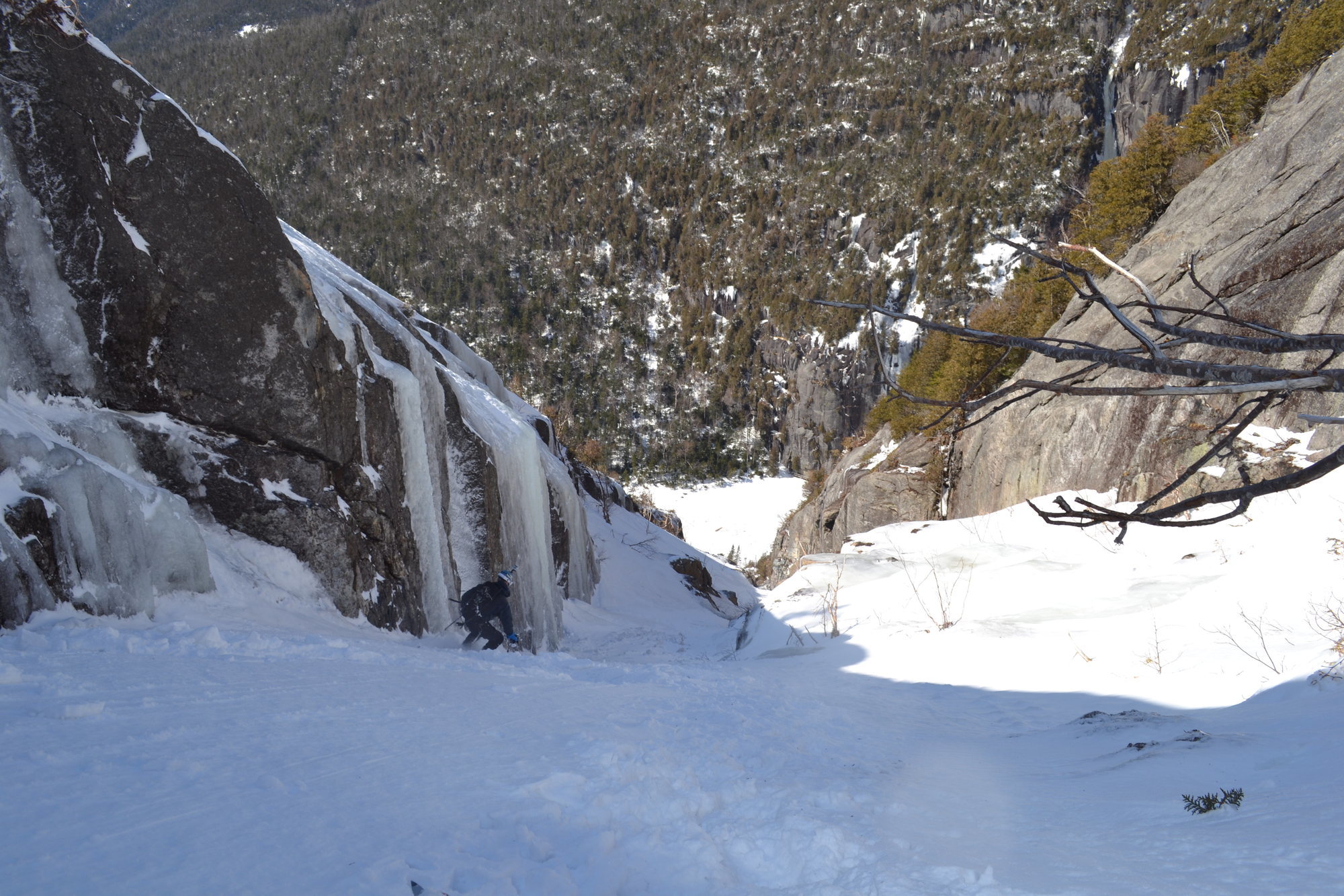 Skiing back down to the first rappel.